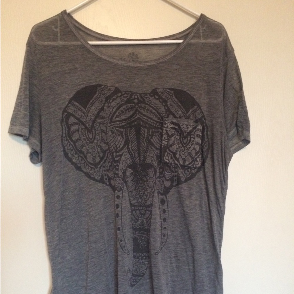 Short with an elephant in front